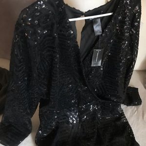 Woman’s plus size 18/20 sequins black romper NWT